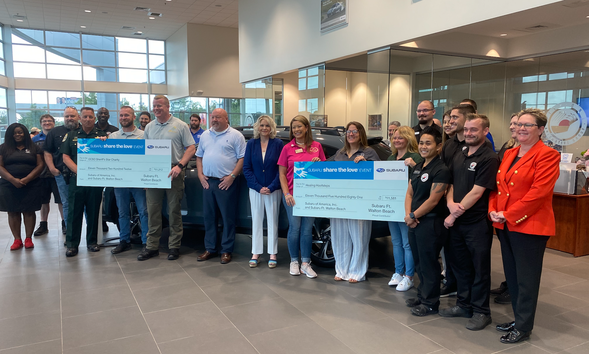 Step One Automotive Group Presents $22,000 to Subaru Share the Love® Event