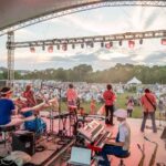 Mattie Kelly Arts Foundation (MKAF) invites music fans to gather under the stars at the picturesque Dugas Pavilion for the much-anticipated 2025 Concerts in the Village series