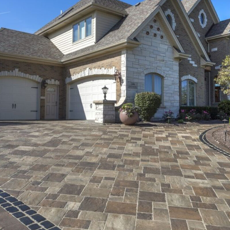 Enhance your curb appeal with a stunning paver driveway! Our expert paver installation creates durable, stylish driveways that boost your home’s value and make a lasting impression. Get the perfect blend of functionality and beauty—contact us today!